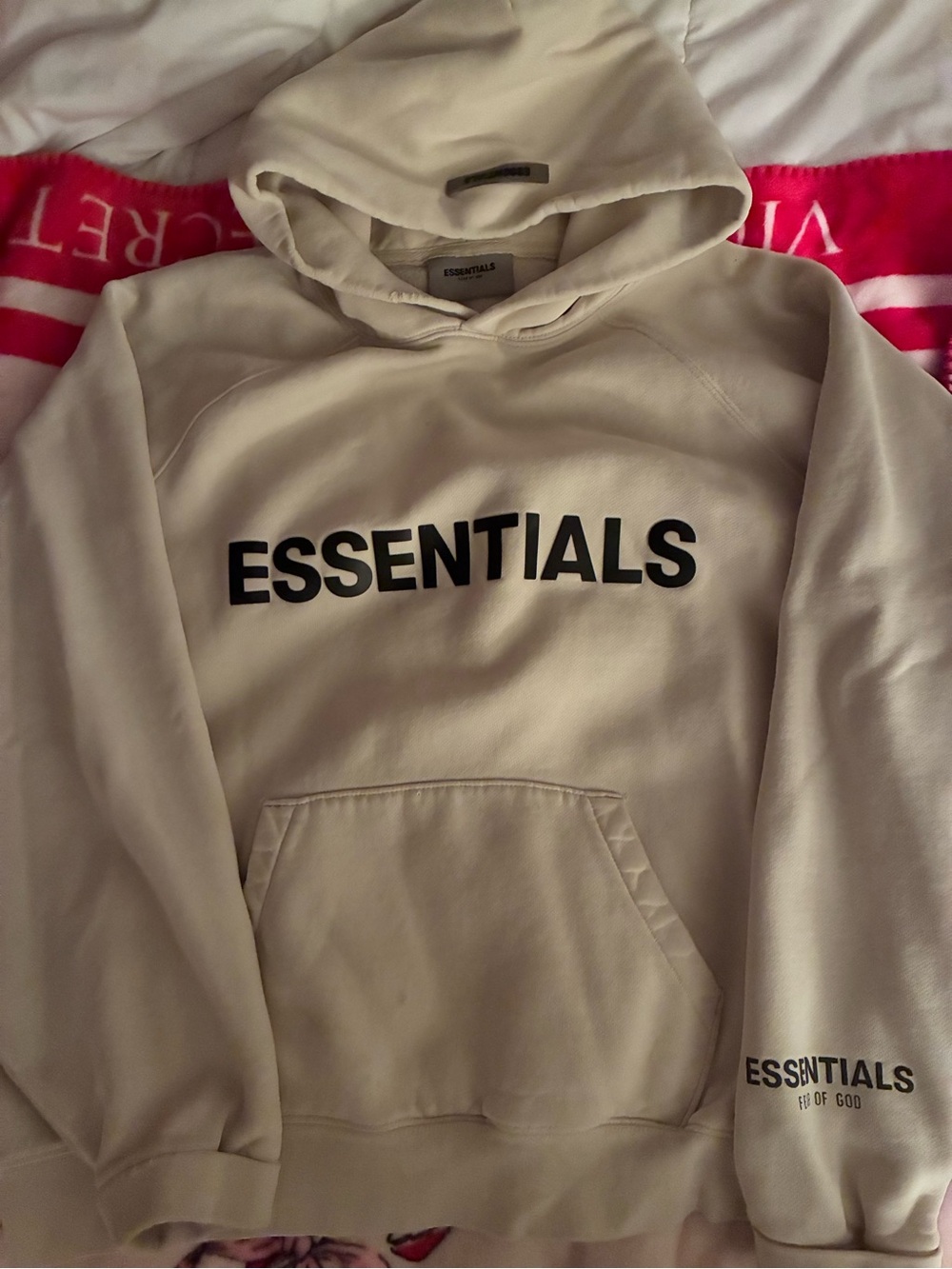 Fear of God ESSENTIALS Cream Hoodie with Black Logo